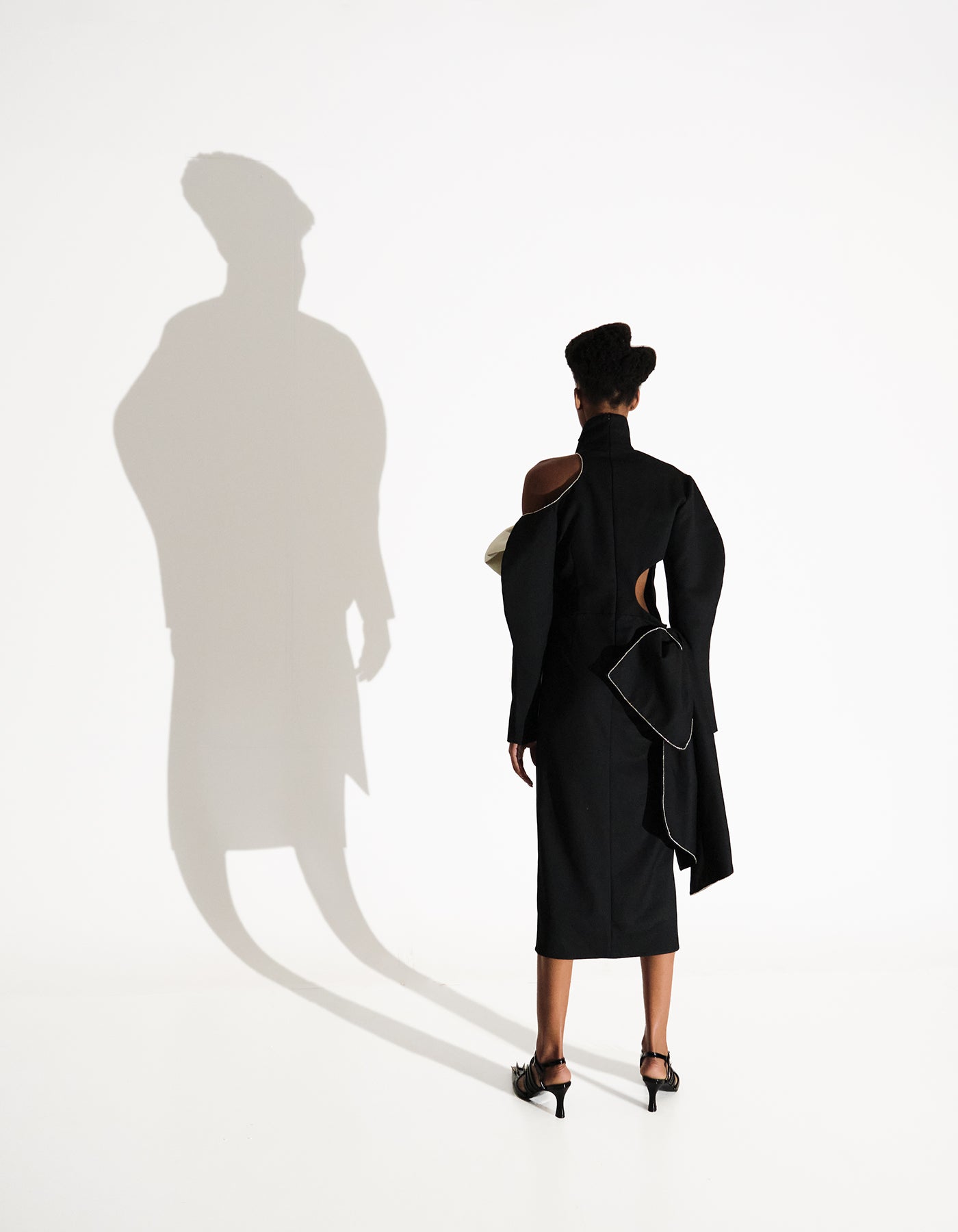 Asymmetric Black Turtleneck Dress with Bows