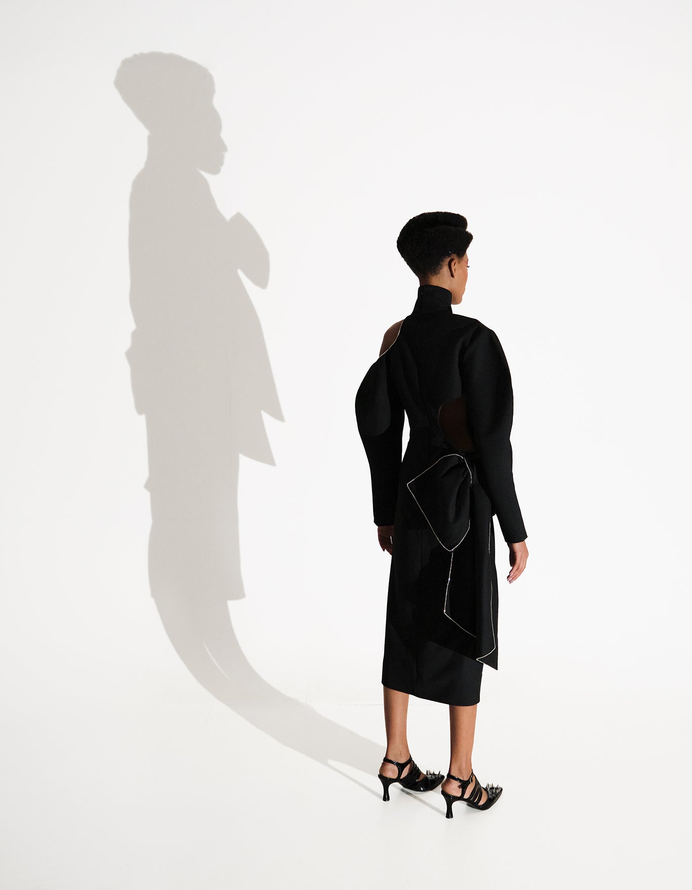 Asymmetric Black Turtleneck Dress with Bows